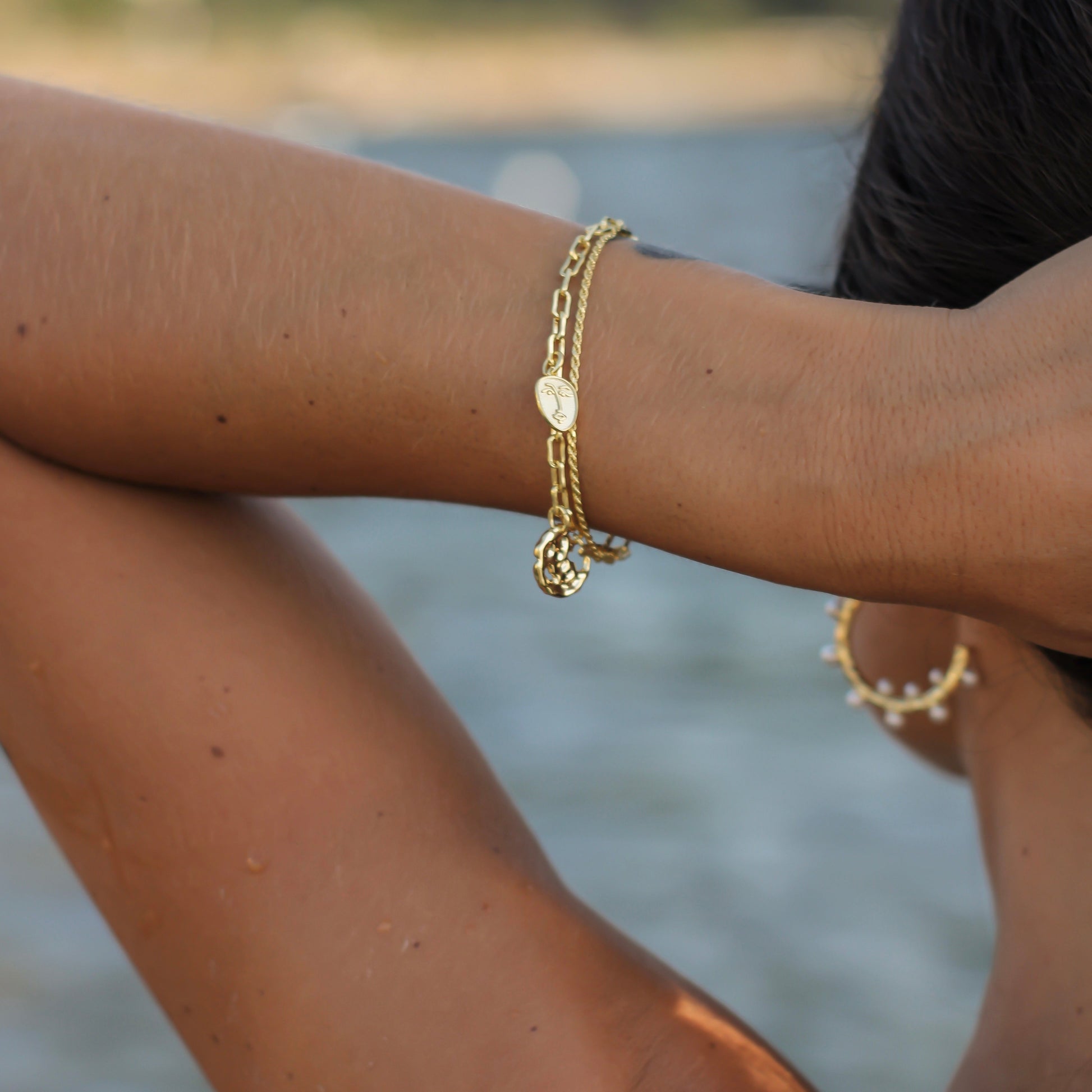 FACCIA BRACCIALE ORO